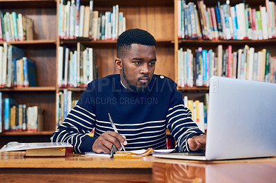Buy stock photo Library, laptop and university student with research, learning and planning for exam, report or focus on computer, studying or education. Black man, college and working on task, essay or scholarship