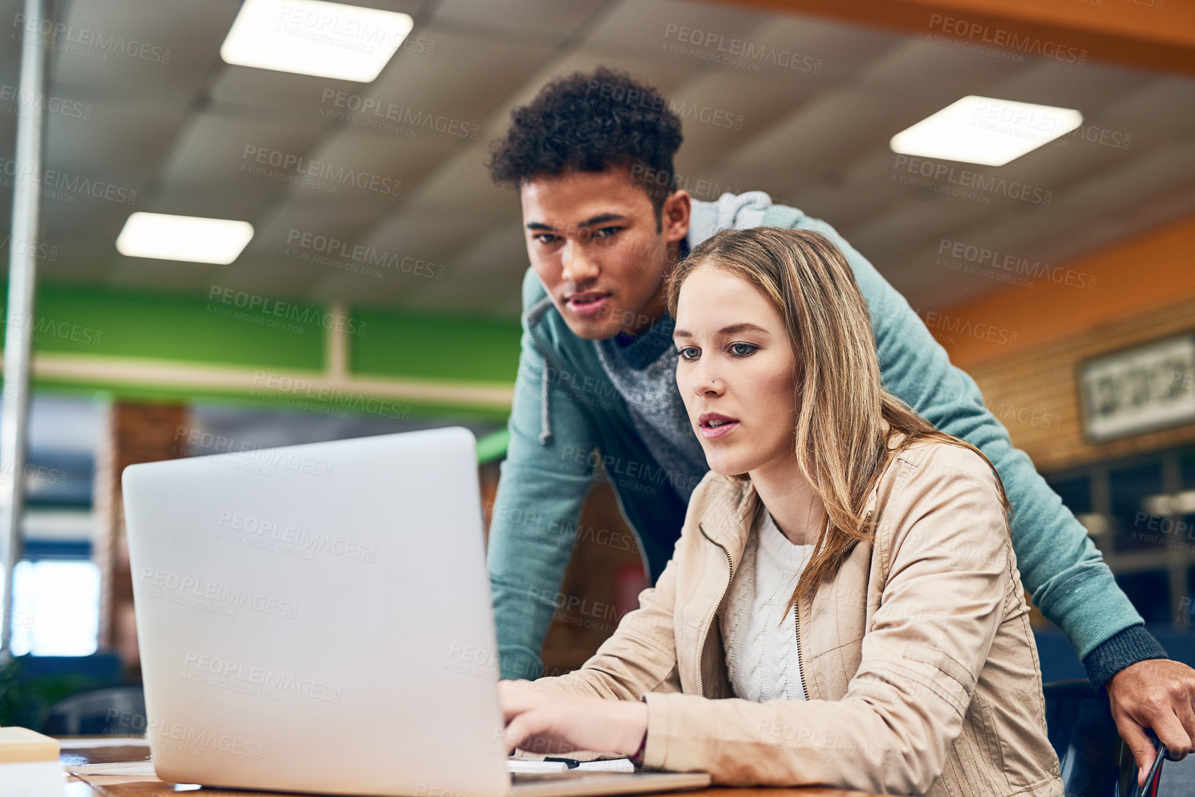 Buy stock photo Students, man and woman with reading, laptop and library with notes for learning, development and research. Person, happy and partner with education, scholarship and studying in hall at university