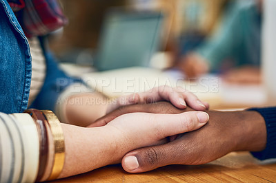 Buy stock photo Cropped shot of two people holding hands