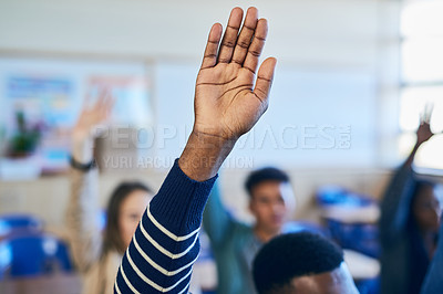 Buy stock photo Cropped shot of an unrecognizable varsity student raising his hand in class