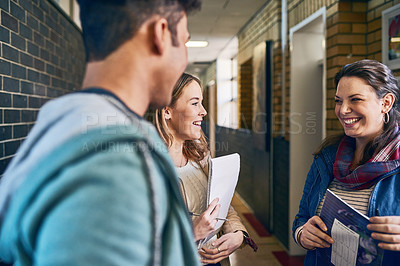 Buy stock photo Shot of young people in the passage at campus 
