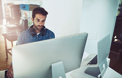 Buy stock photo Serious, computer and business man in office for planning, reading email or network online in creative startup. Pc, programmer and code software for information technology, internet or cyber security