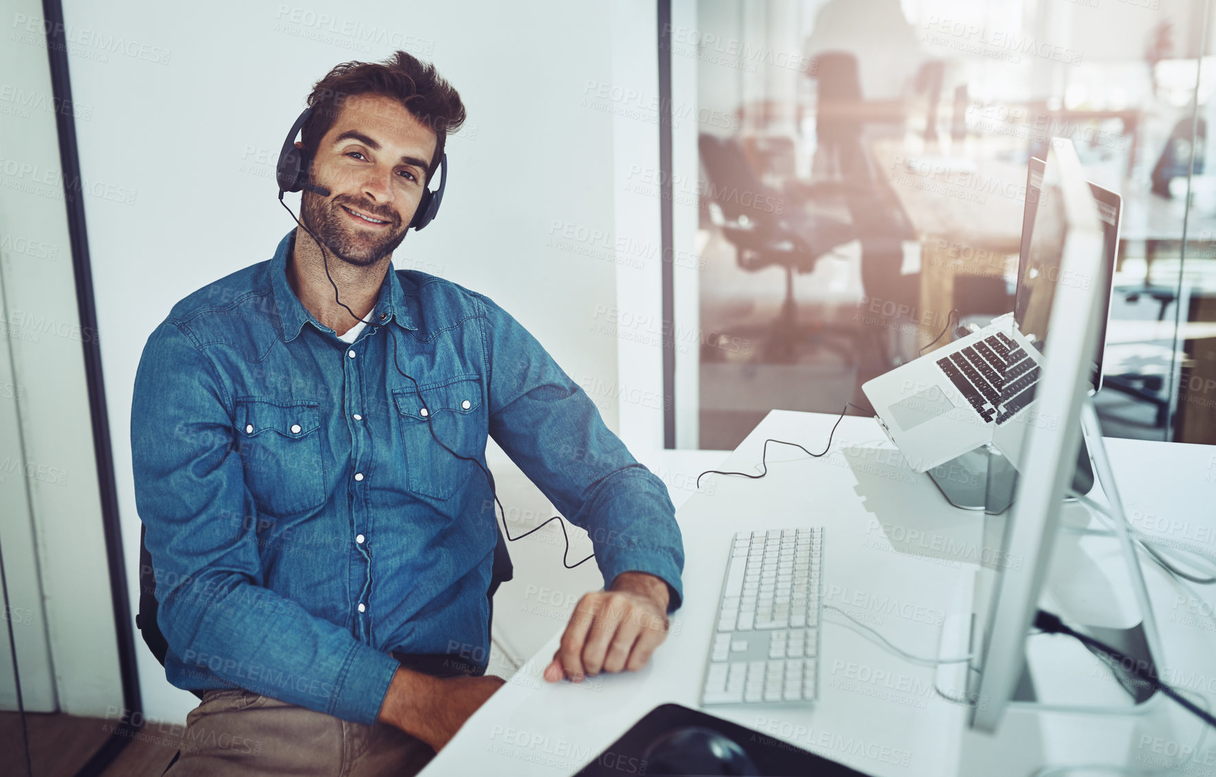 Buy stock photo Man, portrait and computer with headset, smile and office for technical or customer support. Call center agent, company and corporate service with workplace, happiness and employee tech confidence