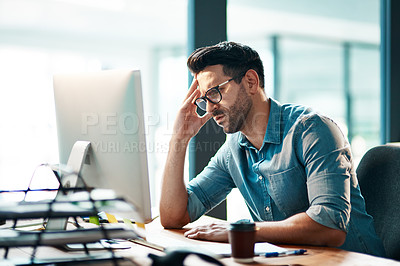 Buy stock photo Stress, headache and frustrated business man working on computer in an office, annoyed and anxious. Male under pressure from a workload and deadline. Depressed guy experiencing burnout at work