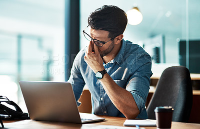 Buy stock photo Stressed, tired and frustrated business man with headache at night from burnout or making mistake on laptop. Overworked creative entrepreneur failing to meet late office deadline or working overtime