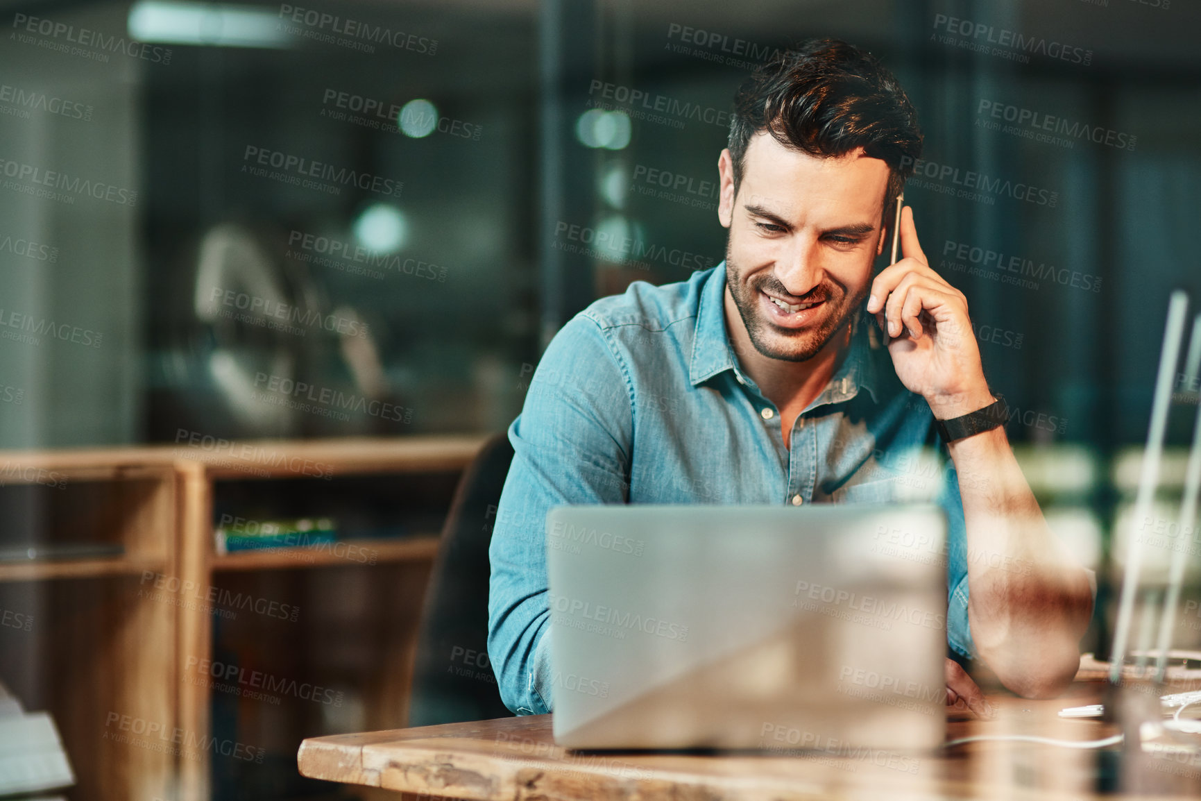 Buy stock photo Happy man talking with phone at laptop in office, conversation and communication for online planning. Male worker, cellphone contact and call at computer for mobile networking in startup business 