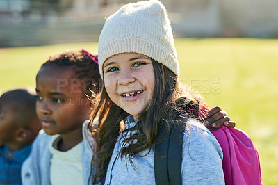 Buy stock photo Portrait of an elementary school girl standing outside with her friends