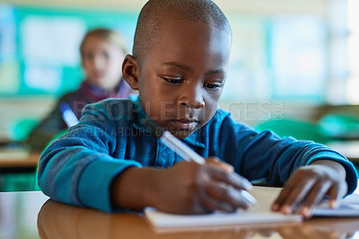 Buy stock photo African boy, writing and notes at school for learning, listen and development for education. Child, notebook and thinking with information, scholarship or study with progress for future in classroom