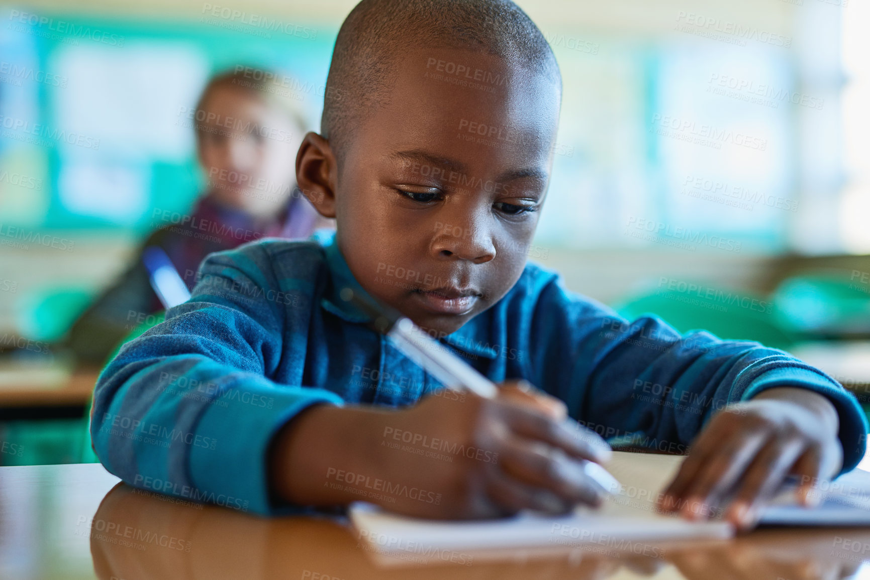 Buy stock photo African boy, writing and notes at school for learning, listen and development for education. Child, notebook and thinking with information, scholarship or study with progress for future in classroom