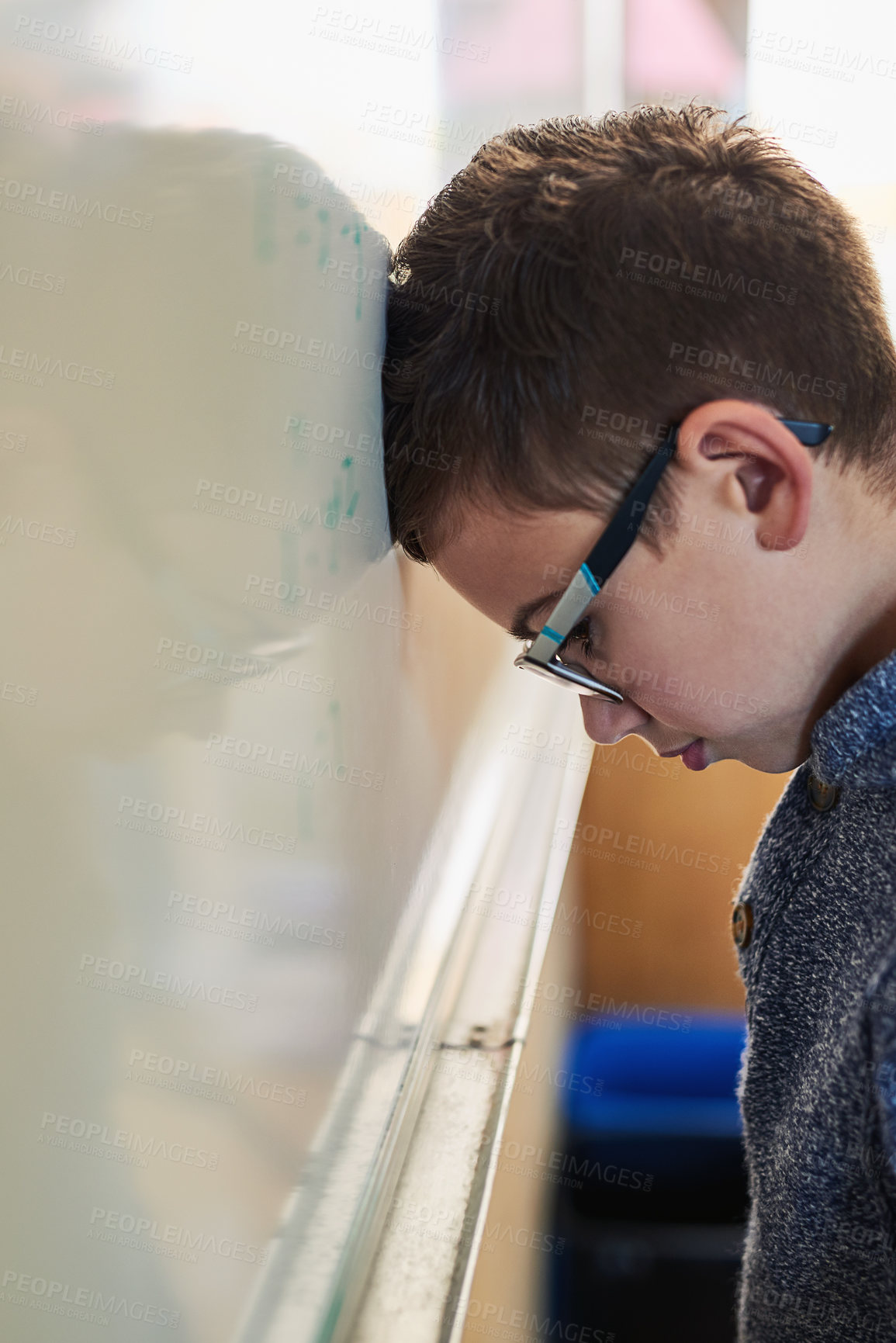 Buy stock photo Class, board and frustrated boy child with math problem, thinking and time out at elementary school. Thinking, confused and young student at whiteboard for education, learning and kids development