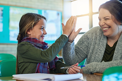 Buy stock photo High five, student and teacher happy to help with work, study and learning math in classroom and girl, education, book and pen. Child, success and achievement in school or helping, woman and support