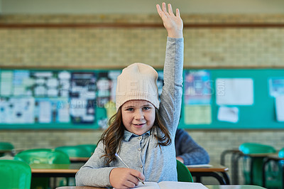 Buy stock photo Portrait of an elementary school girl raising her hand in class