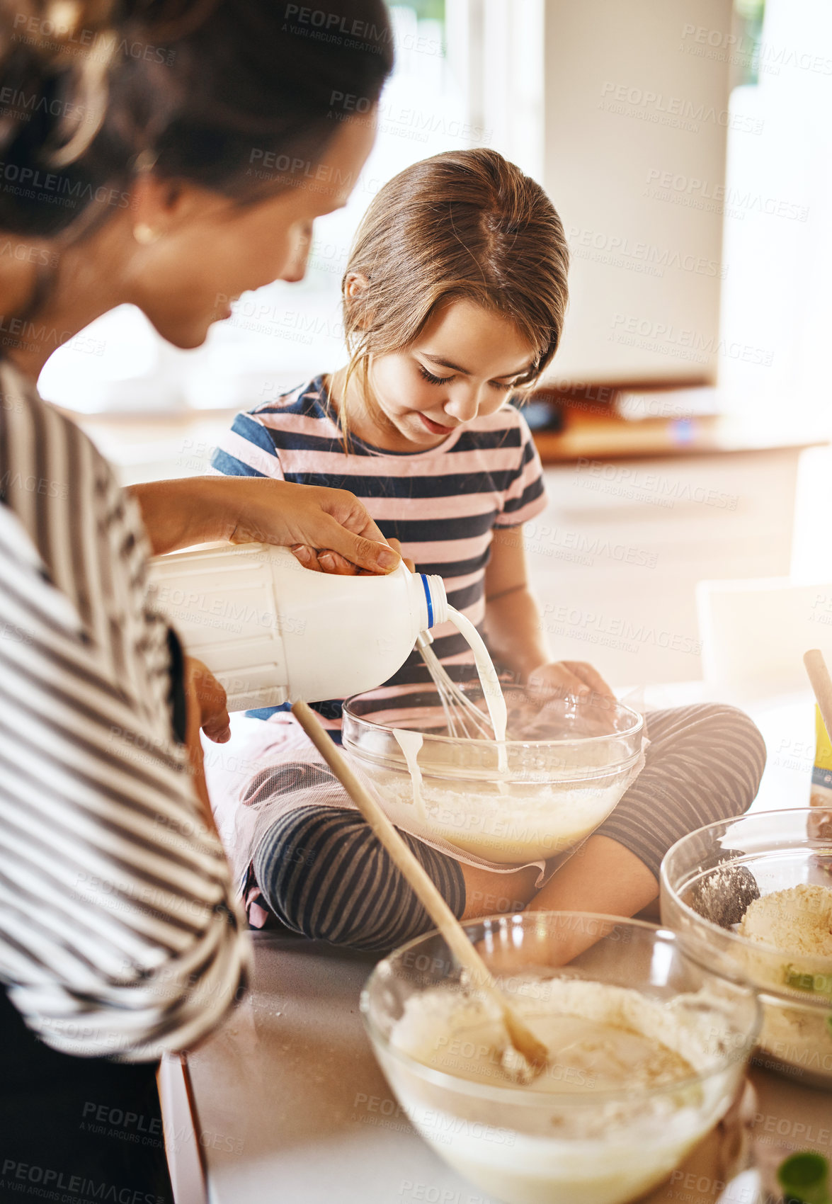 Buy stock photo Mother, milk or girl baking in kitchen as a happy family with a kid learning cookies or cake recipe at home. Smile, cooking or mother baker helping or teaching daughter to bake for child development