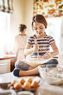 Buy stock photo Fun, mixing flour or girl baking in kitchen for cookies pastry or cooking recipe preparation at home. Bowl, playful or young child learning to bake for skills development or independence in a house