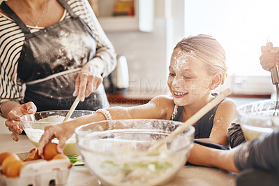 Buy stock photo Learning, playing or messy kid baking in kitchen with a young girl smiling with flour on a dirty face at home. Smile, happy or parent cooking or teaching a fun daughter to bake for child development 