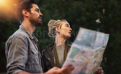 Buy stock photo Travel, map and couple thinking in outdoor for adventure, holiday or directions in Budapest. Tourist, young woman and thoughtful man with document for location, search destination or sightseeing