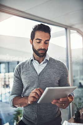 Buy stock photo Business, tech and man with tablet, typing and internet for online news, productivity and research for article. Person, employee and journalist with email, digital app and graphic design in office