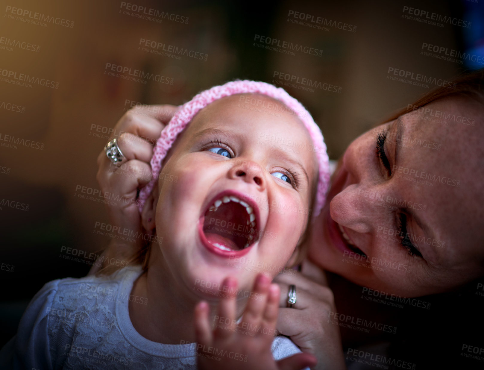 Buy stock photo Shot of a mother bonding with her adorable little girl at home