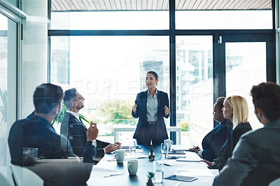 Buy stock photo Cropped shot of an attractive young businesswoman giving a presentation in the boardroom