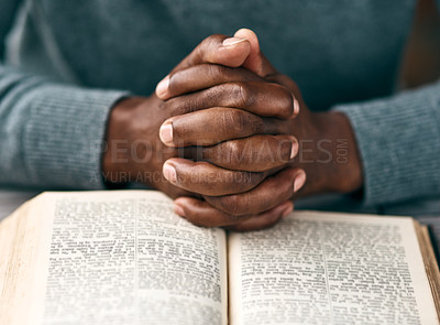 Buy stock photo Cropped shot of an unrecognizable man reading a book