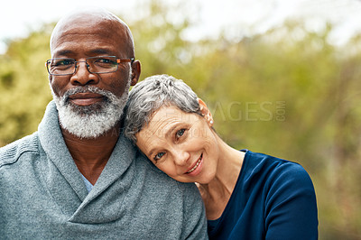 Buy stock photo Shot of a happy senior couple enjoying quality time at the park