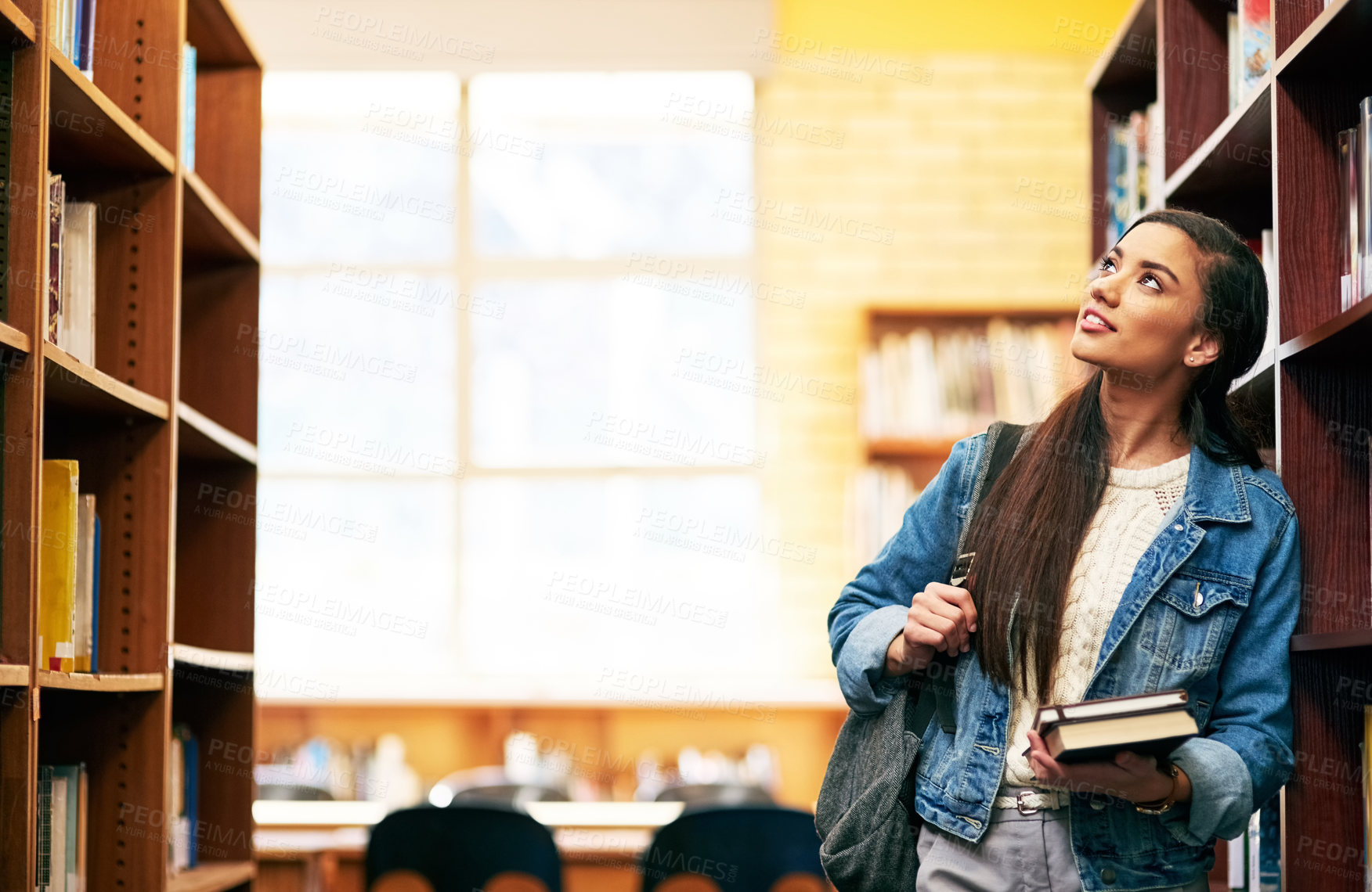 Buy stock photo Thinking, student and girl with books in library with choice for education, school and study at college. Career option, ideas and woman for research, course knowledge and daydreaming at university