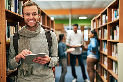 Buy stock photo Portrait of a university student using a digital tablet in the library at campus