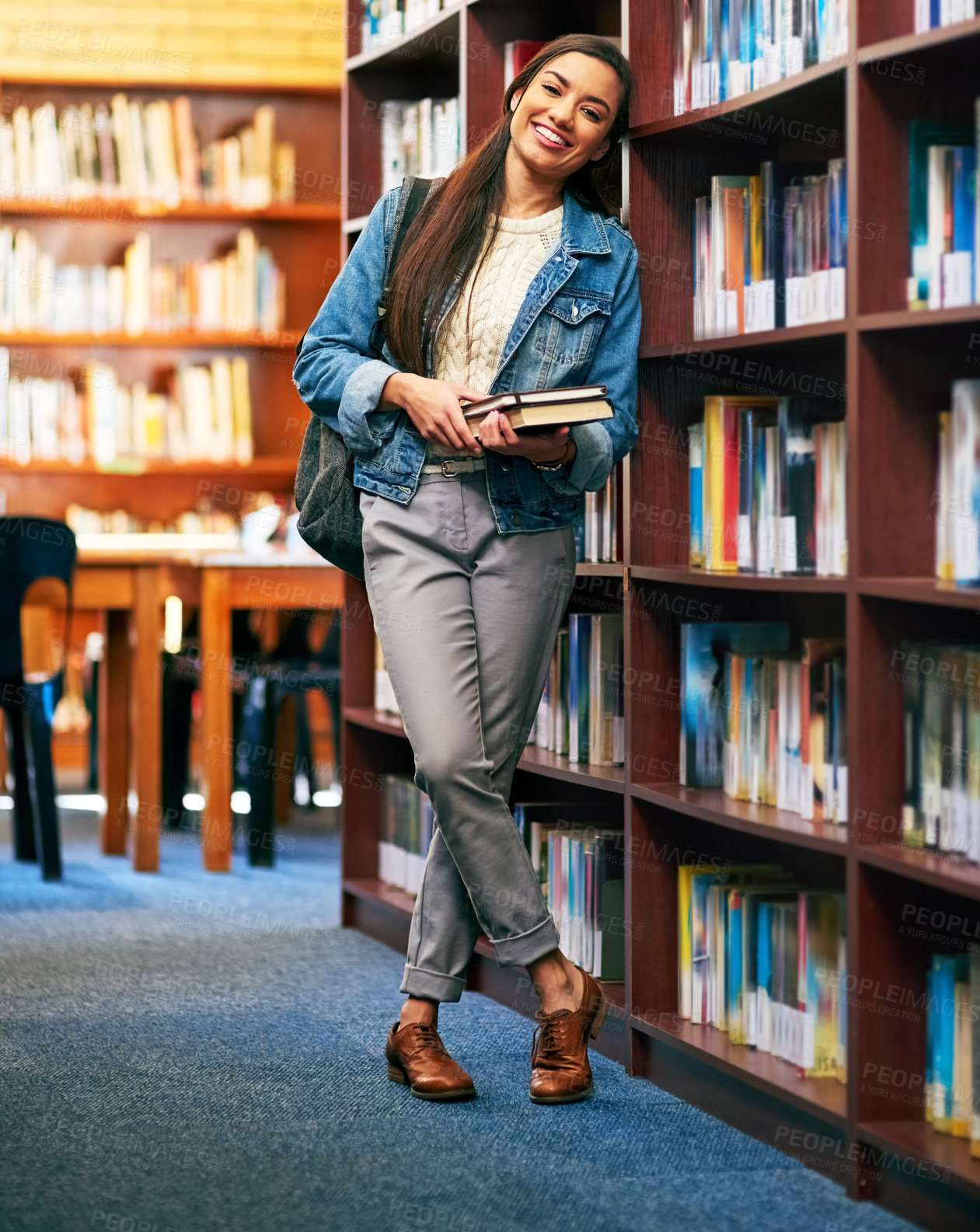 Buy stock photo Woman, portrait and student in library with books, happy and academy literature for university thesis on campus. Education, knowledge and college information for scholarship, assignment and bookshelf