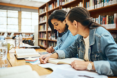 Buy stock photo Education, library and girl student friends on college or university campus for learning together. Books, reading and research with learner people at school for development, homework or study