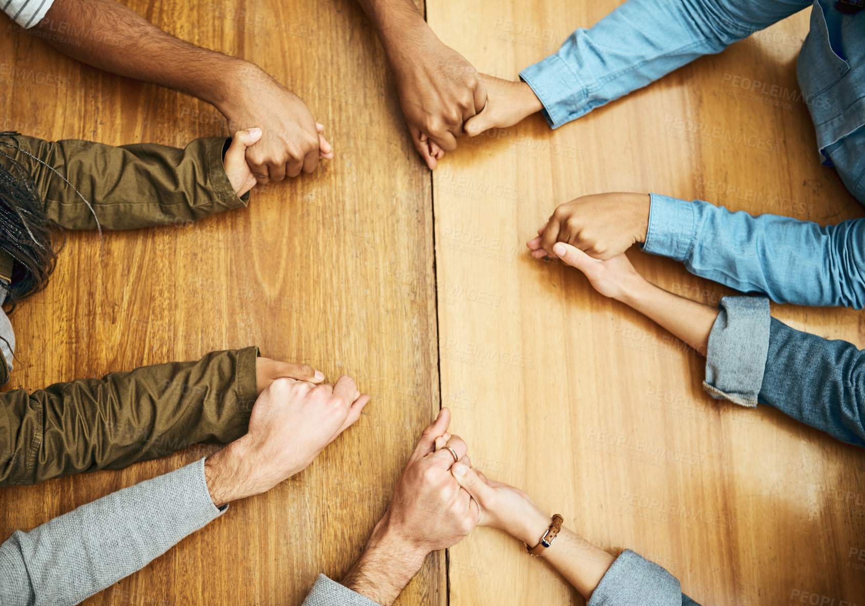 Buy stock photo Hands, support and praying people with trust, love and care for religion or spiritual connection as a group or team. Above, community and christian family doing worship prayer for gratitude