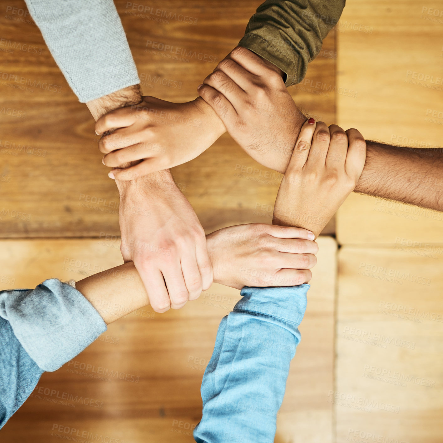 Buy stock photo Students, study and holding hands for support, people and university exam with collaboration in top view. Friends, trust and teamwork on campus for college, education and community or social society