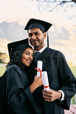 Buy stock photo Hug, graduate students and happy couple with certificate for goal achievement, success or scholarship. Smile, man and woman at graduation with diploma scroll outdoor for learning award at university