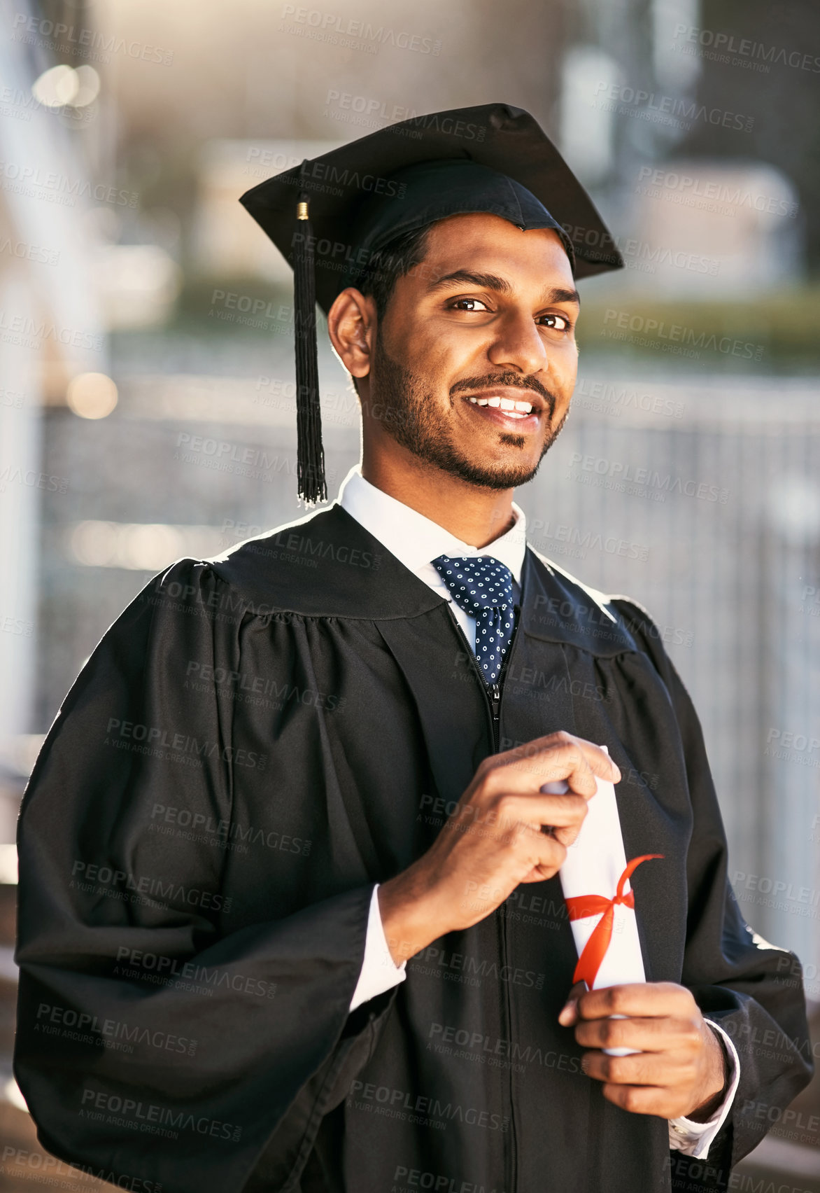 Buy stock photo Graduation, student and portrait with certificate outdoor for diploma ceremony, achievement and college award. Indian graduate, happy and scholarship success with academic milestone, degree and event