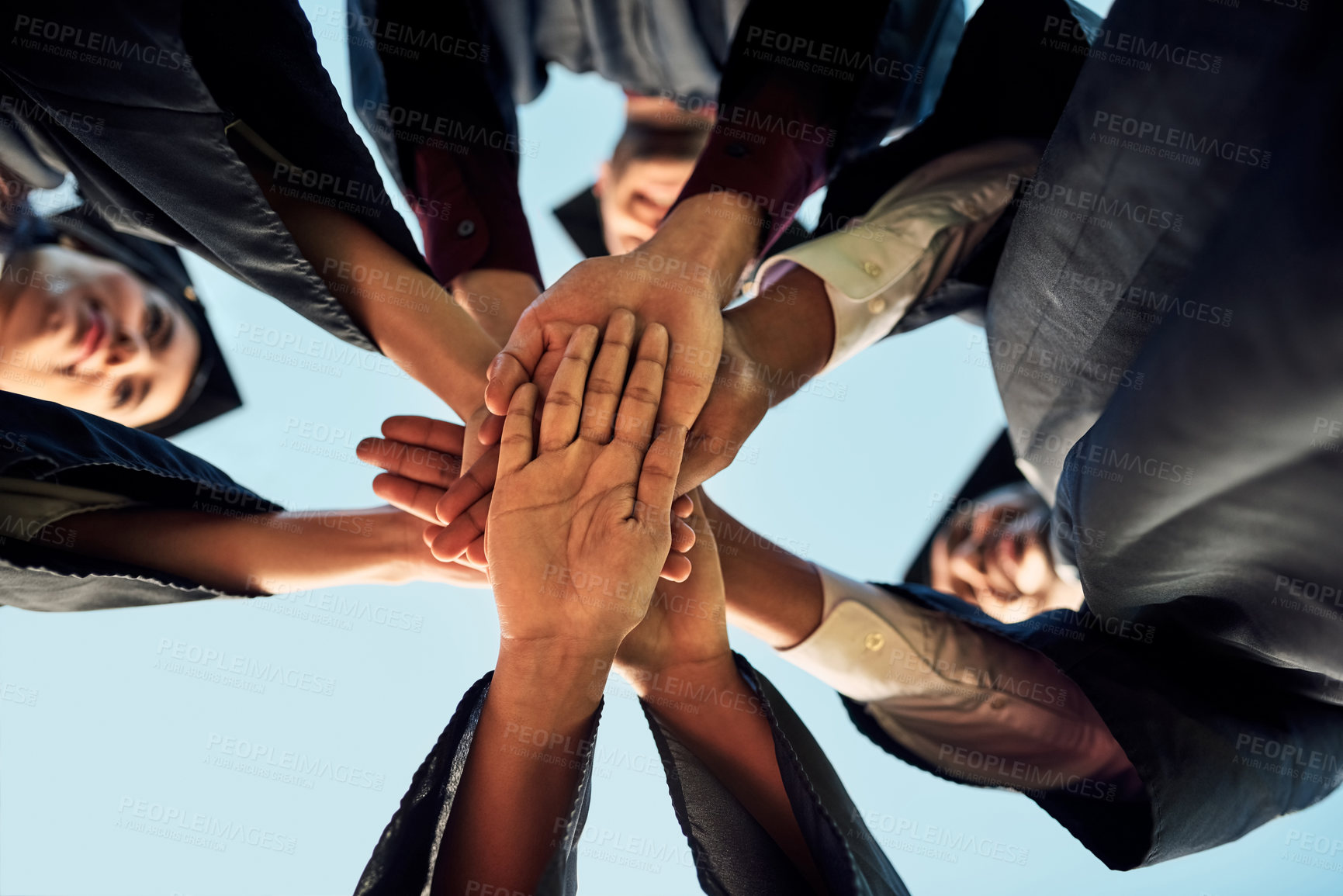 Buy stock photo Education, sky and stack of hands, graduation and success for group, above and celebration in event. Outdoor, students and people in ceremony, knowledge and friends in university, honor and milestone