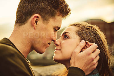 Buy stock photo Happy couple, kiss and touch with intimacy in city for love, affection or embrace on outdoor holiday together. Young man, woman or lovers for romantic date, commitment or honeymoon in an urban town