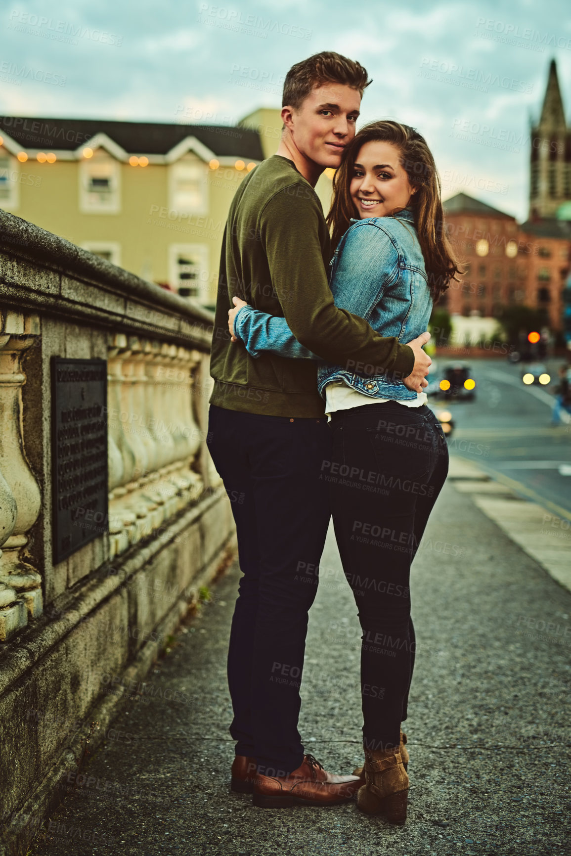 Buy stock photo Cropped shot of a young couple out on a date in the city