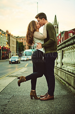 Buy stock photo Couple, kiss and love in city for vacation, date and relationship together with loyalty, trust and care. Man, woman and holiday for connection, bonding and romance as partner with travel in London