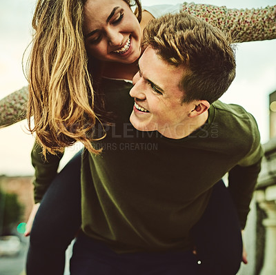 Buy stock photo Couple, piggyback and date in city for love, support or trust in relationship. Happy woman, man or carry on street for journey, outing and bonding, fun memories or freedom in town with care or travel