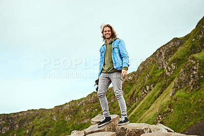 Buy stock photo Shot of a handsome man travelling outdoors