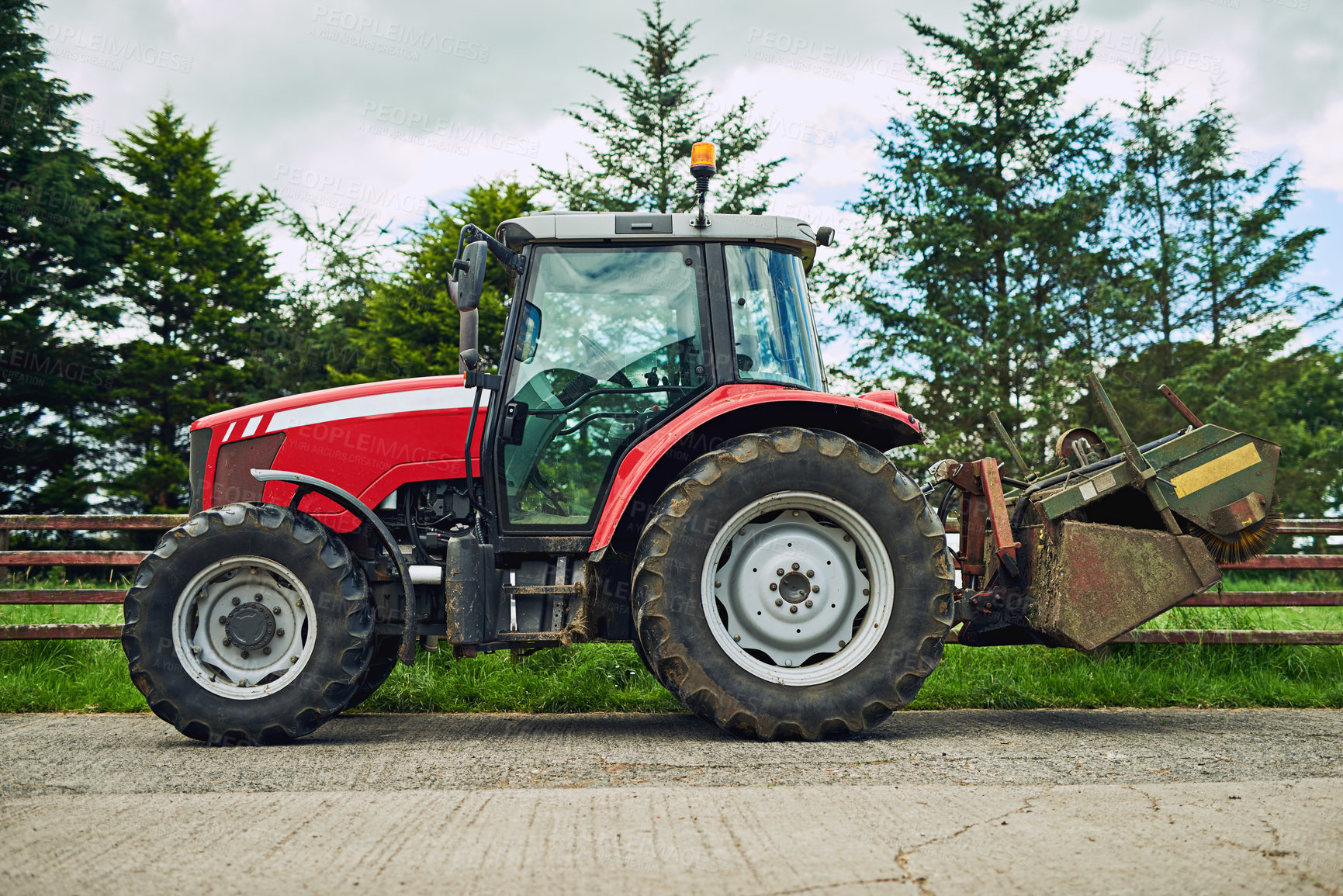 Buy stock photo Outdoor, countryside and agriculture with tractor for driving, tiling and cultivation of soil for crop growth. Blue sky, nature and machine truck on farm for harvesting, planting and sowing of seeds