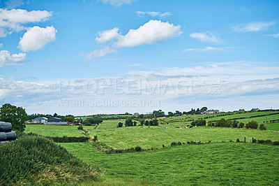 Buy stock photo Blue sky, countryside and nature with landscape, farm and environment for agriculture Empty, grass and trees with industry, organic produce or green pasture for eco friendly sustainability outdoor