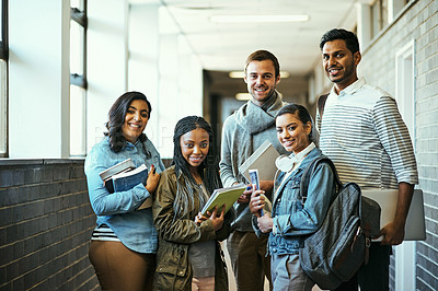Buy stock photo Cropped portrait of a group of university students standing in a campus corridor