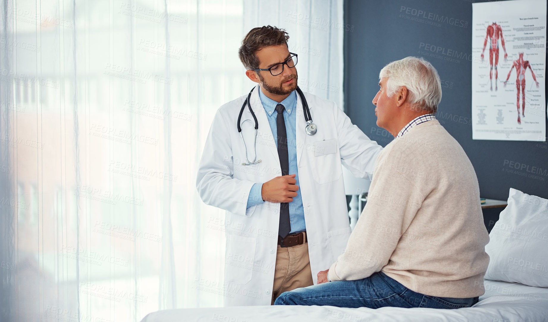 Buy stock photo Shot of a doctor examining a senior patient in a clinic