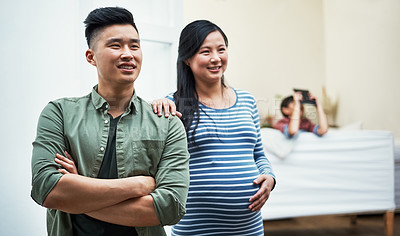 Buy stock photo Shot of a family bonding together at home