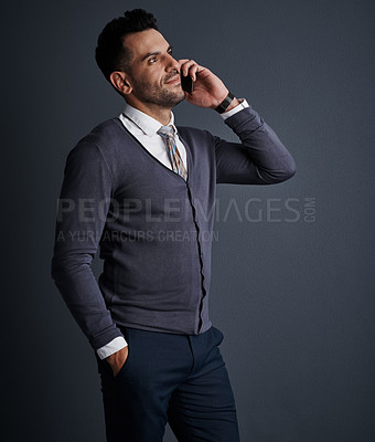 Buy stock photo Listen, businessman and mobile call in studio for finance offer, connection or networking. Phone, person and consultant talk with contact for investment, advice and communication on gray background