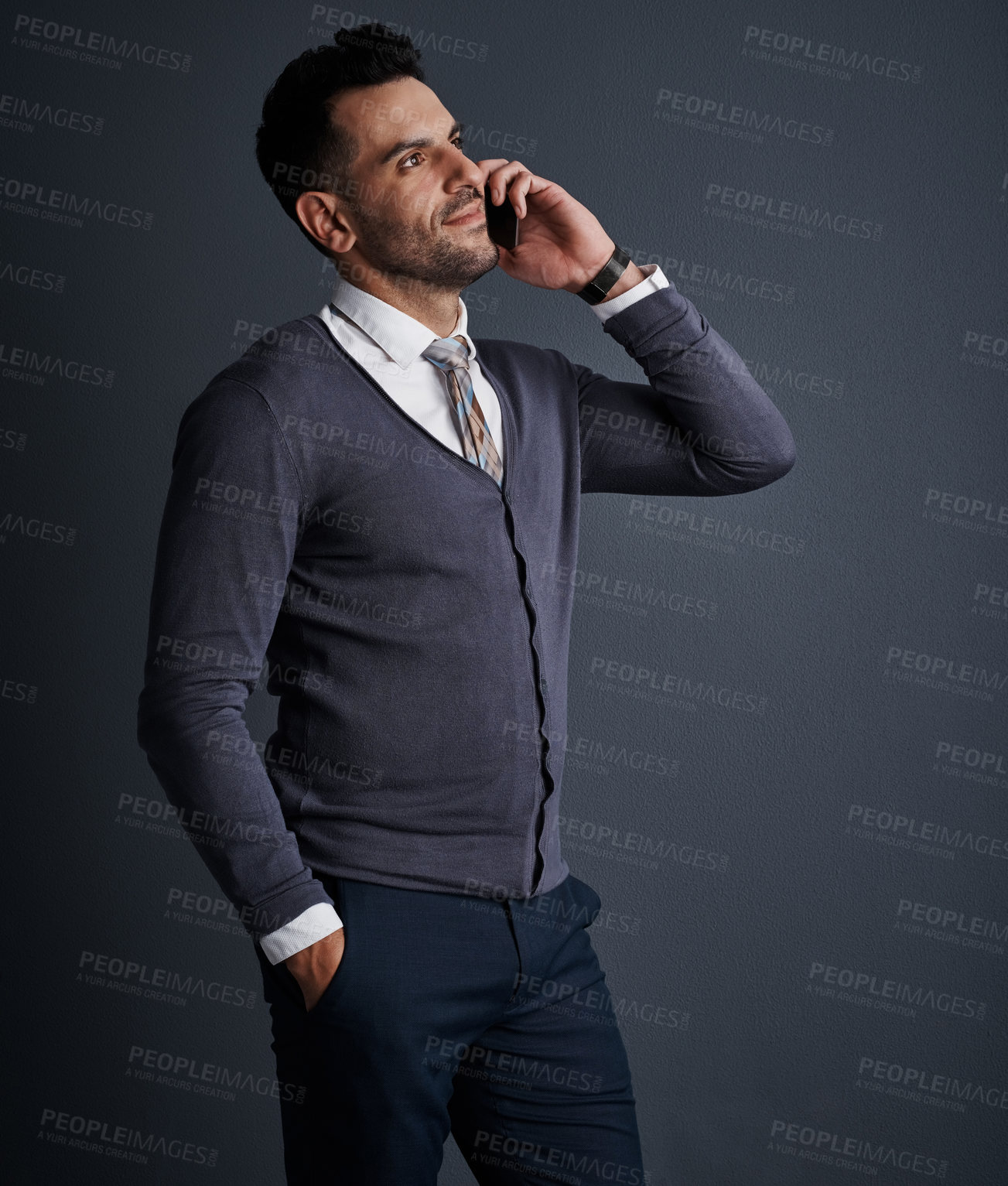 Buy stock photo Listen, businessman and mobile call in studio for finance offer, connection or networking. Phone, person and consultant talk with contact for investment, advice and communication on gray background