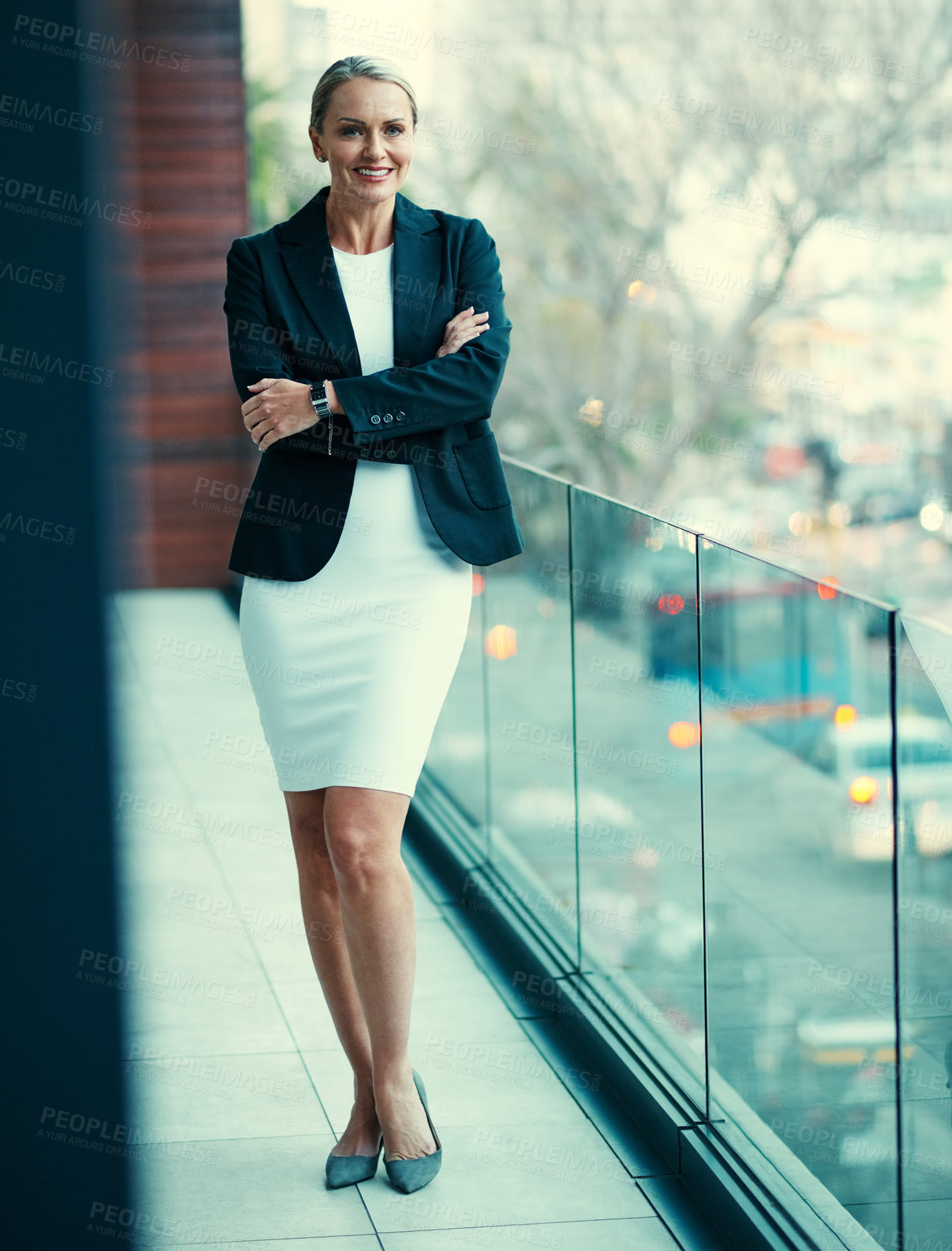 Buy stock photo Business woman, portrait and smile for realtor, real estate agency and about us on balcony. Mature entrepreneur, property management and arms crossed in office for development, consultant and service