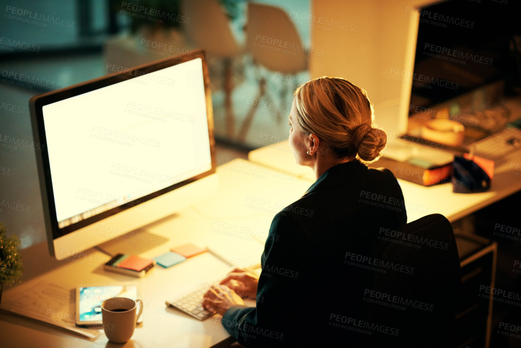 Buy stock photo Night, woman and typing in office with computer, news report deadline or investigation for journalism. Back, mockup space and person with pc, research and work late to fact check article for website.