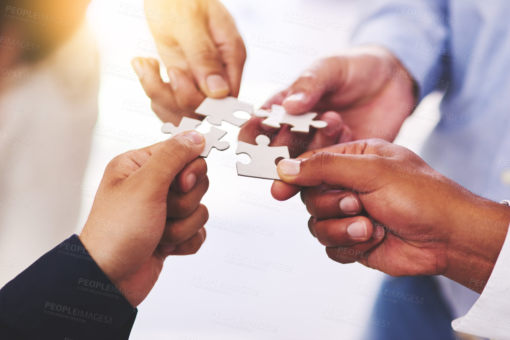 Buy stock photo Diversity, business and hands of people with puzzle for unity or collaboration with joint effort for project. Group, teamwork and pieces together for planning or partnership, union and engagement.