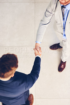 Buy stock photo Businessman, handshake and meeting with partnership above for agreement, b2b or deal together at office. Top view of employee or colleagues shaking hands for teamwork, unity or thank you at workplace
